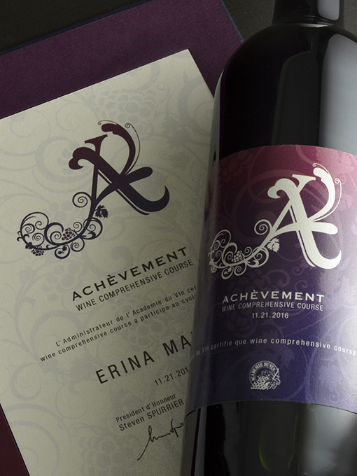 Wine school’s final wine course completion certificate and anniversary wine bottle