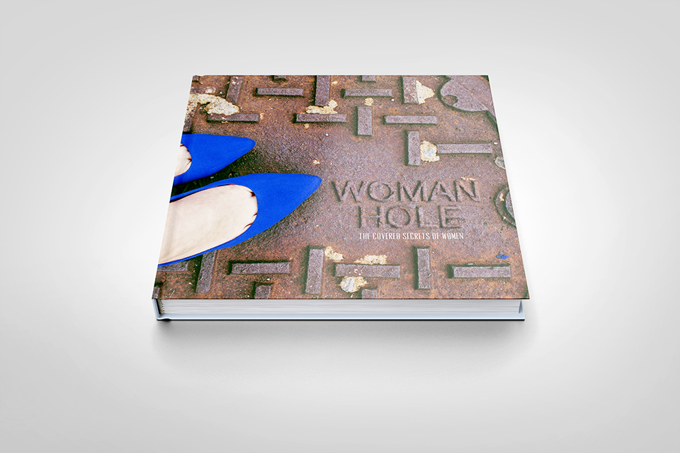 Found Typography - "Woman Hole" 